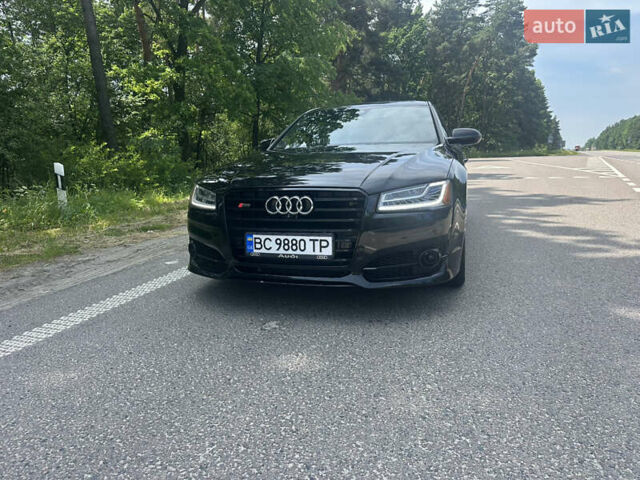 Черный Ауди А8, объемом двигателя 3 л и пробегом 130 тыс. км за 24000 $, фото 1 на Automoto.ua