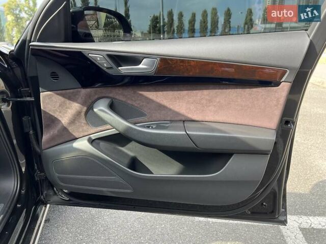 Черный Ауди А8, объемом двигателя 2.97 л и пробегом 245 тыс. км за 25000 $, фото 4 на Automoto.ua