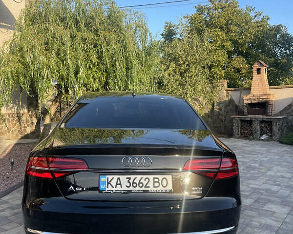 Черный Ауди А8, объемом двигателя 2.97 л и пробегом 140 тыс. км за 32500 $, фото 1 на Automoto.ua