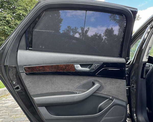 Черный Ауди А8, объемом двигателя 2.97 л и пробегом 158 тыс. км за 29999 $, фото 26 на Automoto.ua