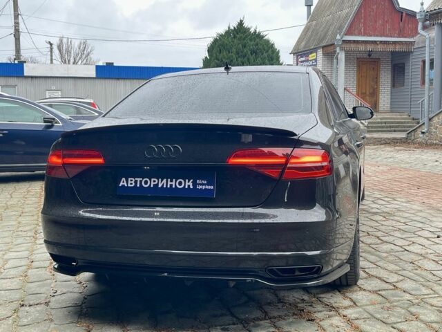 Черный Ауди А8, объемом двигателя 3 л и пробегом 160 тыс. км за 32500 $, фото 2 на Automoto.ua