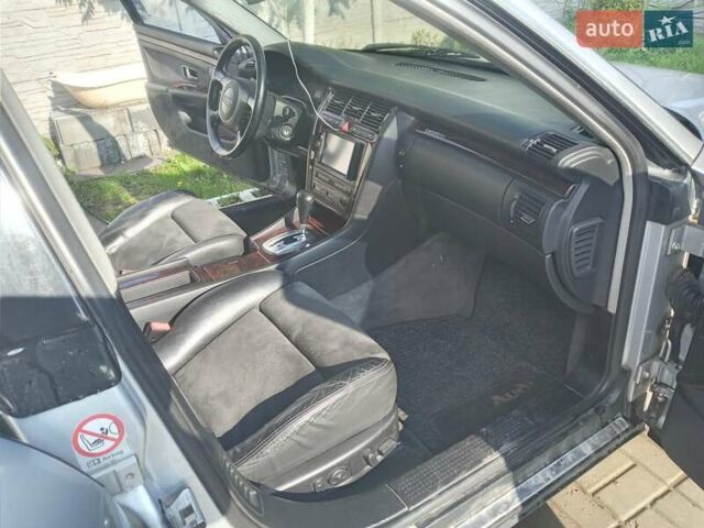 Серый Ауди А8, объемом двигателя 2.5 л и пробегом 250 тыс. км за 5750 $, фото 7 на Automoto.ua