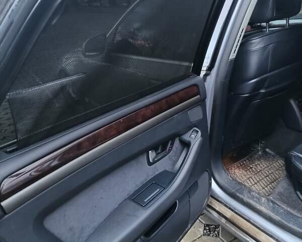 Серый Ауди А8, объемом двигателя 2.97 л и пробегом 382 тыс. км за 10500 $, фото 13 на Automoto.ua