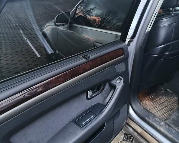 Серый Ауди А8, объемом двигателя 2.97 л и пробегом 382 тыс. км за 10500 $, фото 14 на Automoto.ua