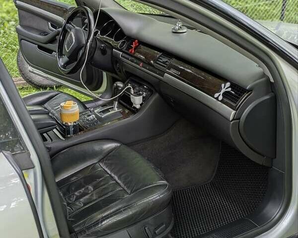 Серый Ауди А8, объемом двигателя 3 л и пробегом 324 тыс. км за 9699 $, фото 3 на Automoto.ua