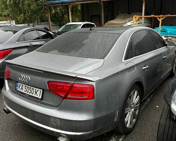 Серый Ауди А8, объемом двигателя 3 л и пробегом 193 тыс. км за 10950 $, фото 1 на Automoto.ua