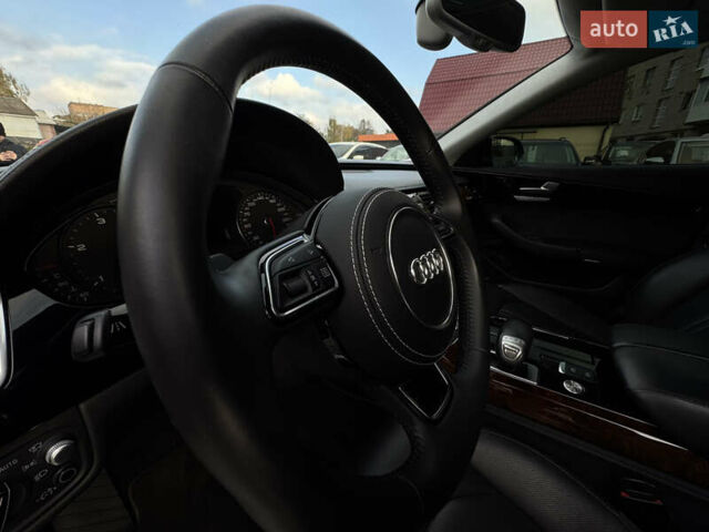 Ауді A8 2014 у Бердичеве на Automoto.ua Сірий Ауді A8, об'ємом двигуна 4.2 л та пробігом 239 тис. км за 34500 $, фото 40 на Automoto.ua