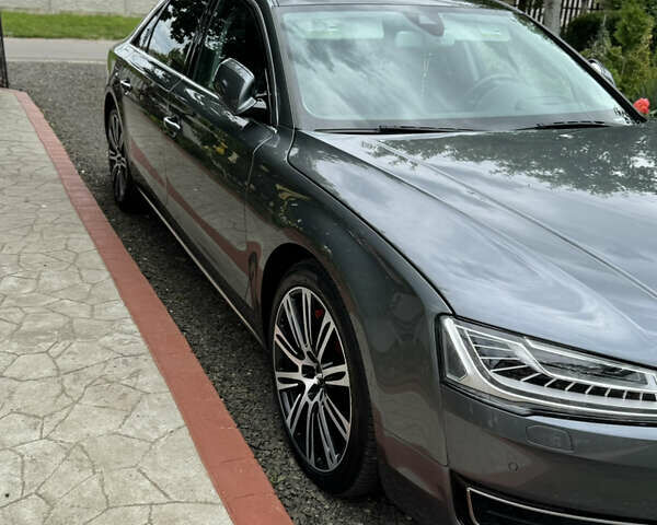 Серый Ауди А8, объемом двигателя 3 л и пробегом 128 тыс. км за 22500 $, фото 1 на Automoto.ua
