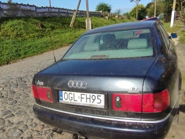 Синий Ауди А8, объемом двигателя 3 л и пробегом 240 тыс. км за 2500 $, фото 4 на Automoto.ua