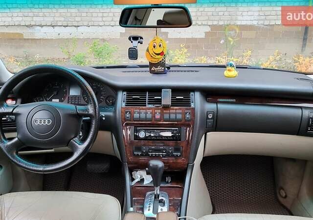 Синий Ауди А8, объемом двигателя 4.2 л и пробегом 232 тыс. км за 6100 $, фото 9 на Automoto.ua