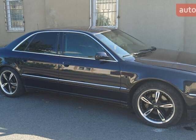 Синий Ауди А8, объемом двигателя 2.5 л и пробегом 352 тыс. км за 3800 $, фото 1 на Automoto.ua