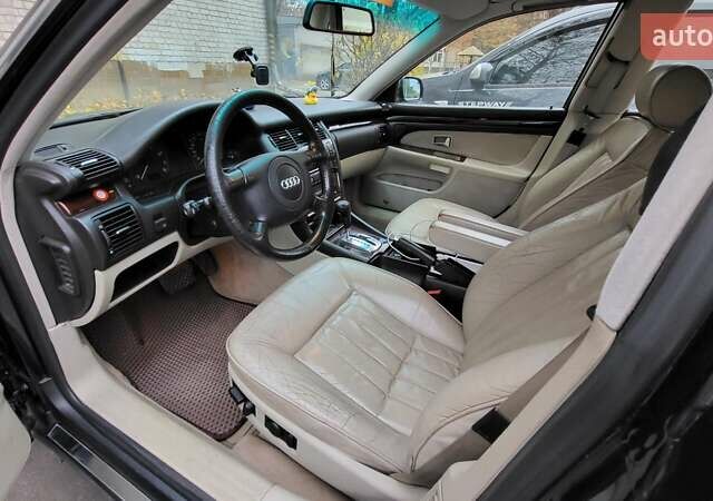 Синий Ауди А8, объемом двигателя 4.2 л и пробегом 232 тыс. км за 6100 $, фото 2 на Automoto.ua