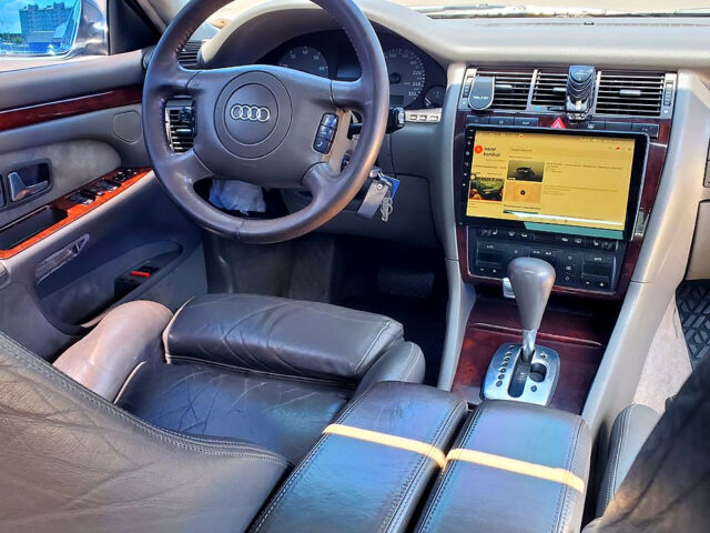 Синий Ауди А8, объемом двигателя 4.2 л и пробегом 338 тыс. км за 7750 $, фото 11 на Automoto.ua
