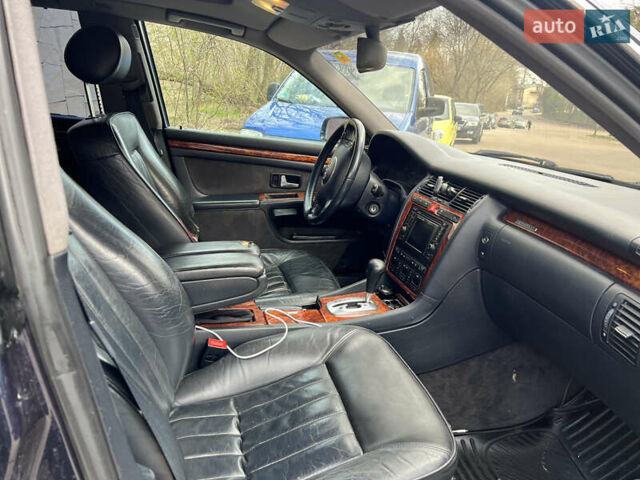 Синий Ауди А8, объемом двигателя 2.5 л и пробегом 387 тыс. км за 4900 $, фото 11 на Automoto.ua