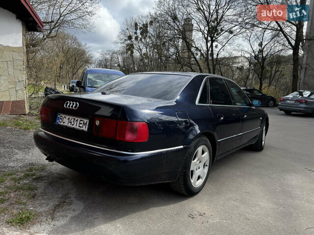 Синий Ауди А8, объемом двигателя 2.5 л и пробегом 387 тыс. км за 4900 $, фото 1 на Automoto.ua