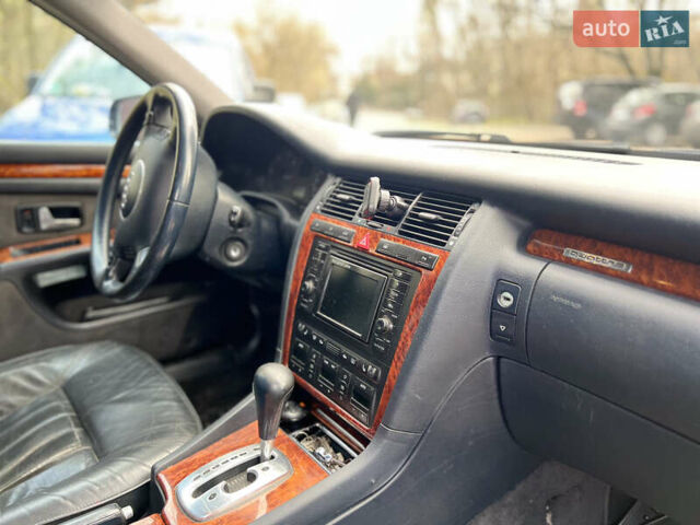 Синий Ауди А8, объемом двигателя 2.5 л и пробегом 387 тыс. км за 4900 $, фото 12 на Automoto.ua