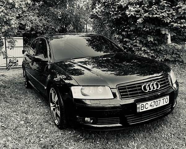 Синий Ауди А8, объемом двигателя 2.97 л и пробегом 386 тыс. км за 8700 $, фото 1 на Automoto.ua