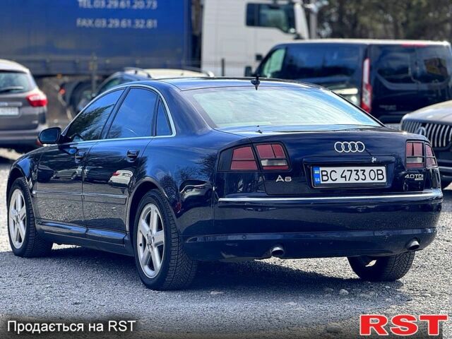 Синий Ауди А8, объемом двигателя 3.9 л и пробегом 450 тыс. км за 7000 $, фото 2 на Automoto.ua