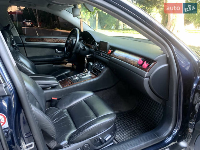 Синий Ауди А8, объемом двигателя 4.2 л и пробегом 366 тыс. км за 7800 $, фото 41 на Automoto.ua