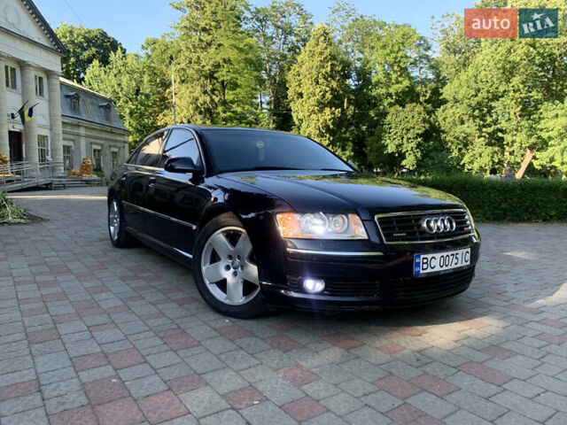 Синий Ауди А8, объемом двигателя 4.2 л и пробегом 366 тыс. км за 7800 $, фото 1 на Automoto.ua
