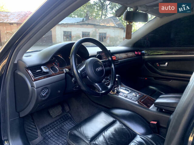 Синий Ауди А8, объемом двигателя 4.2 л и пробегом 366 тыс. км за 7800 $, фото 16 на Automoto.ua