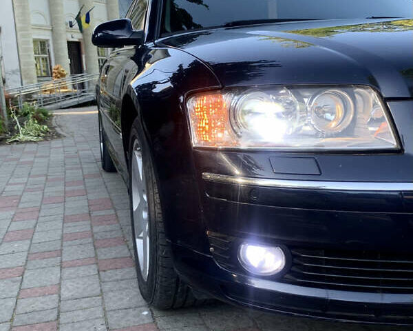 Синий Ауди А8, объемом двигателя 4.2 л и пробегом 366 тыс. км за 7800 $, фото 10 на Automoto.ua