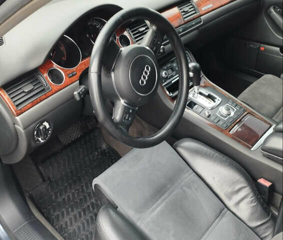 Синий Ауди А8, объемом двигателя 3 л и пробегом 370 тыс. км за 7300 $, фото 9 на Automoto.ua