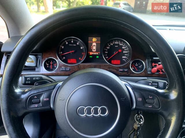 Синий Ауди А8, объемом двигателя 4.2 л и пробегом 366 тыс. км за 7800 $, фото 28 на Automoto.ua