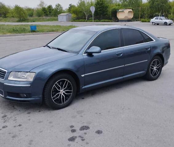 Синий Ауди А8, объемом двигателя 3 л и пробегом 370 тыс. км за 7300 $, фото 1 на Automoto.ua