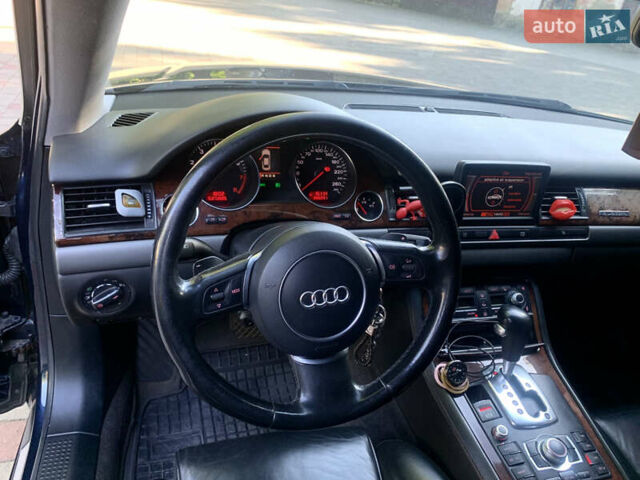 Синий Ауди А8, объемом двигателя 4.2 л и пробегом 366 тыс. км за 7800 $, фото 20 на Automoto.ua