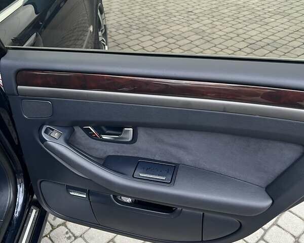 Синий Ауди А8, объемом двигателя 2.97 л и пробегом 386 тыс. км за 8700 $, фото 19 на Automoto.ua