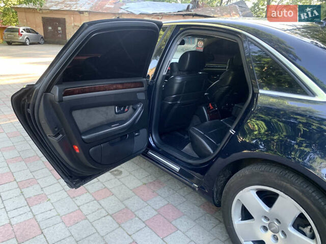 Синий Ауди А8, объемом двигателя 4.2 л и пробегом 366 тыс. км за 7800 $, фото 31 на Automoto.ua