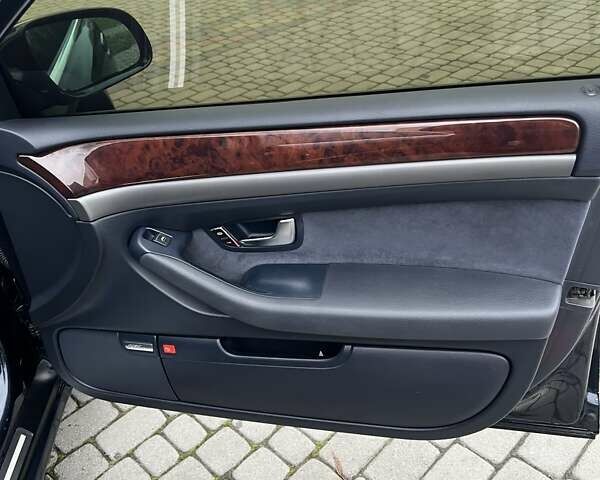 Синий Ауди А8, объемом двигателя 2.97 л и пробегом 386 тыс. км за 8700 $, фото 24 на Automoto.ua