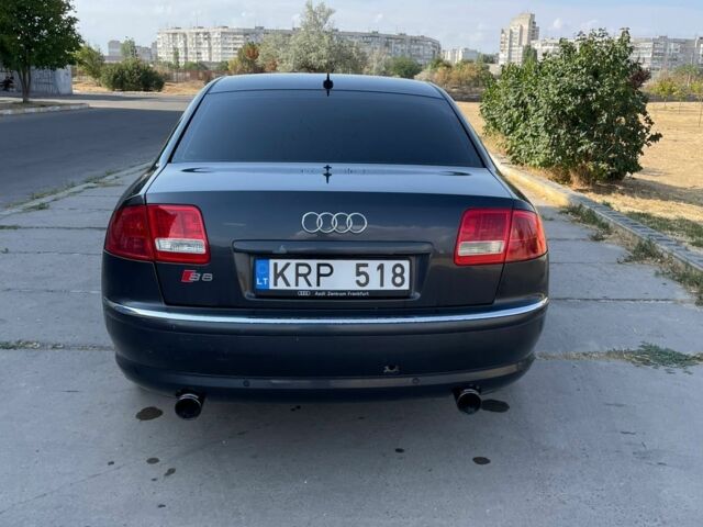 Синий Ауди А8, объемом двигателя 4 л и пробегом 400 тыс. км за 5500 $, фото 4 на Automoto.ua