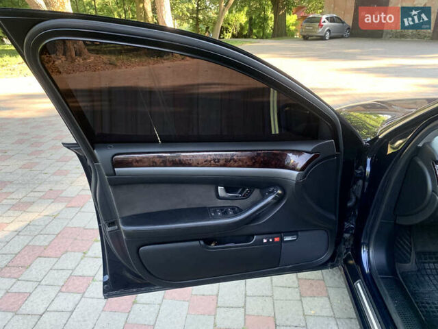 Синий Ауди А8, объемом двигателя 4.2 л и пробегом 366 тыс. км за 7800 $, фото 15 на Automoto.ua