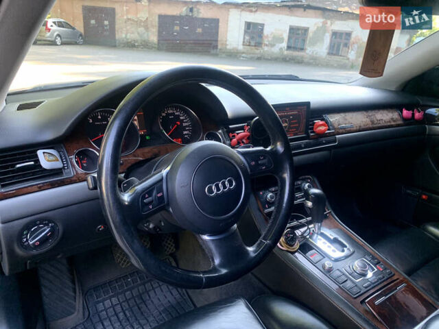 Синий Ауди А8, объемом двигателя 4.2 л и пробегом 366 тыс. км за 7800 $, фото 19 на Automoto.ua