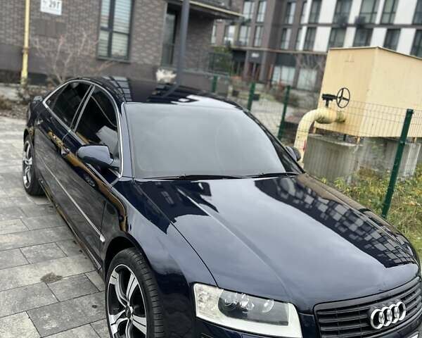 Синий Ауди А8, объемом двигателя 2.97 л и пробегом 386 тыс. км за 8700 $, фото 12 на Automoto.ua