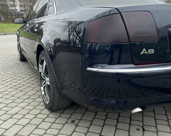 Синий Ауди А8, объемом двигателя 2.97 л и пробегом 386 тыс. км за 8700 $, фото 16 на Automoto.ua