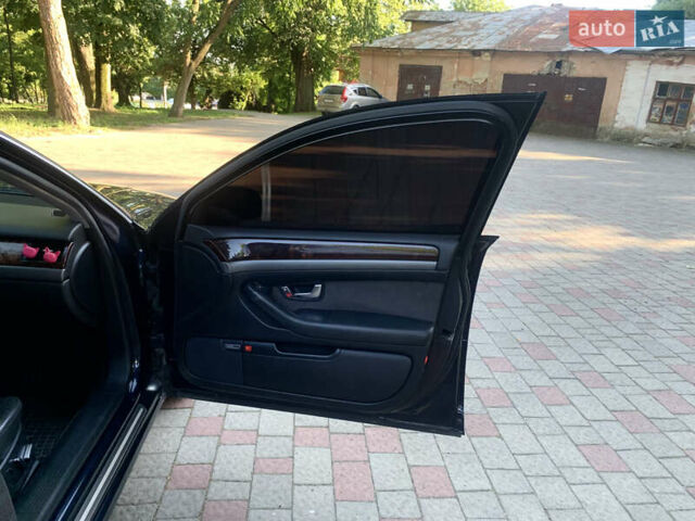 Синий Ауди А8, объемом двигателя 4.2 л и пробегом 366 тыс. км за 8000 $, фото 46 на Automoto.ua