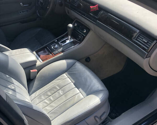 Синий Ауди А8, объемом двигателя 3 л и пробегом 319 тыс. км за 5800 $, фото 11 на Automoto.ua