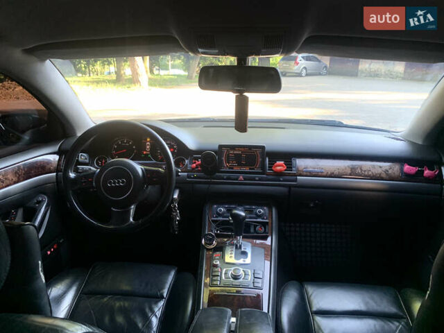 Синий Ауди А8, объемом двигателя 4.2 л и пробегом 366 тыс. км за 7800 $, фото 39 на Automoto.ua