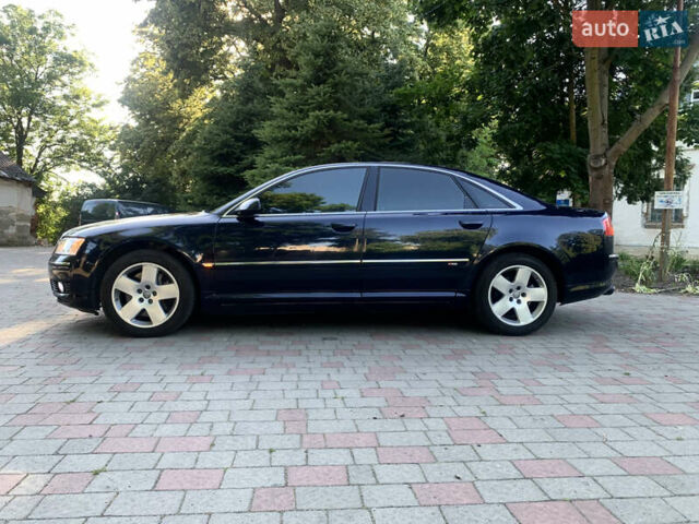 Синий Ауди А8, объемом двигателя 4.2 л и пробегом 366 тыс. км за 7800 $, фото 6 на Automoto.ua