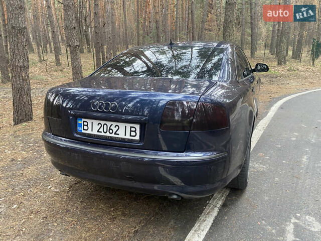 Синій Ауді A8, об'ємом двигуна 3 л та пробігом 328 тис. км за 9000 $, фото 4 на Automoto.ua