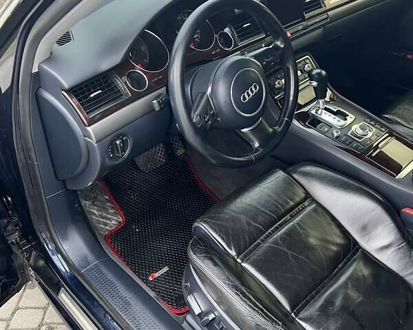 Синий Ауди А8, объемом двигателя 2.97 л и пробегом 386 тыс. км за 8700 $, фото 25 на Automoto.ua