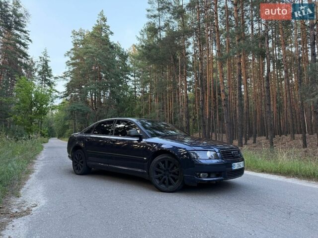 Синий Ауди А8, объемом двигателя 2.97 л и пробегом 317 тыс. км за 6499 $, фото 1 на Automoto.ua