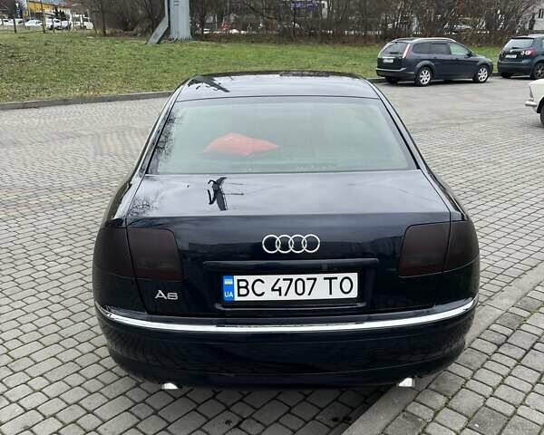 Синий Ауди А8, объемом двигателя 2.97 л и пробегом 386 тыс. км за 8700 $, фото 7 на Automoto.ua
