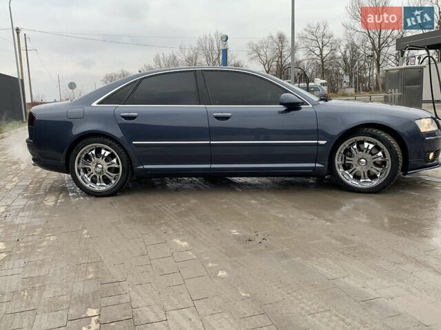 Синий Ауди А8, объемом двигателя 4.2 л и пробегом 352 тыс. км за 12685 $, фото 7 на Automoto.ua