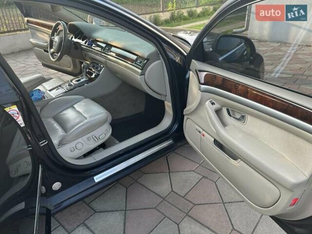 Синий Ауди А8, объемом двигателя 3 л и пробегом 320 тыс. км за 11600 $, фото 13 на Automoto.ua