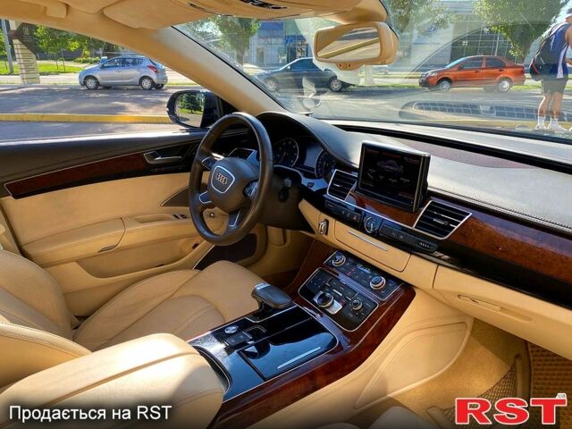 Синий Ауди А8, объемом двигателя 4.2 л и пробегом 213 тыс. км за 18500 $, фото 4 на Automoto.ua