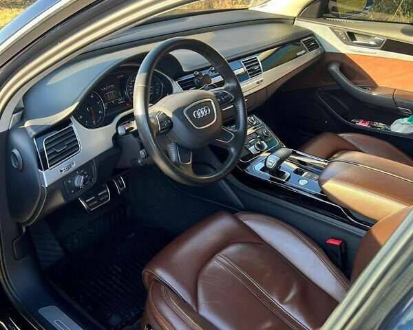 Синий Ауди А8, объемом двигателя 6.3 л и пробегом 160 тыс. км за 28000 $, фото 14 на Automoto.ua